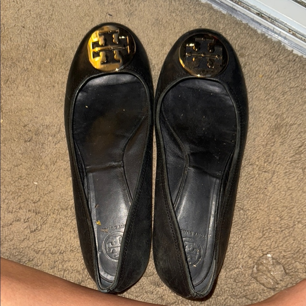 Tory Burch Black and Gold Flats with Signature Medallion